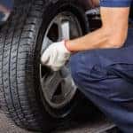 Mechanic Removing Tire