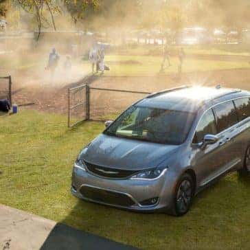 2018 Chrysler Pacifica parked by a baseball field