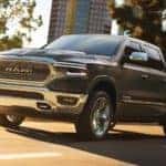 2019 Ram 1500 drives down city street