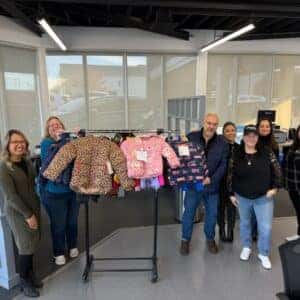 Team Members with the winter coats
