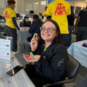 team member and their bracelet