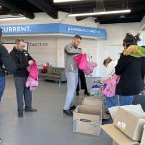 team members packing coats