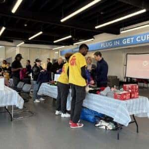 Team members packing up backpacks