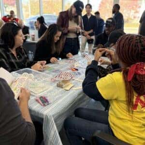 team members decorating bookmarks