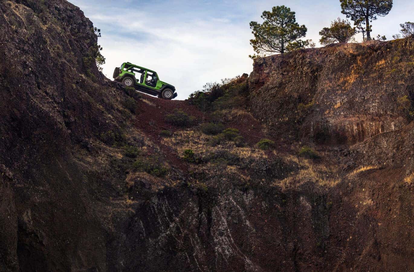 Jeep Wrangler with no doors in rocky terrain