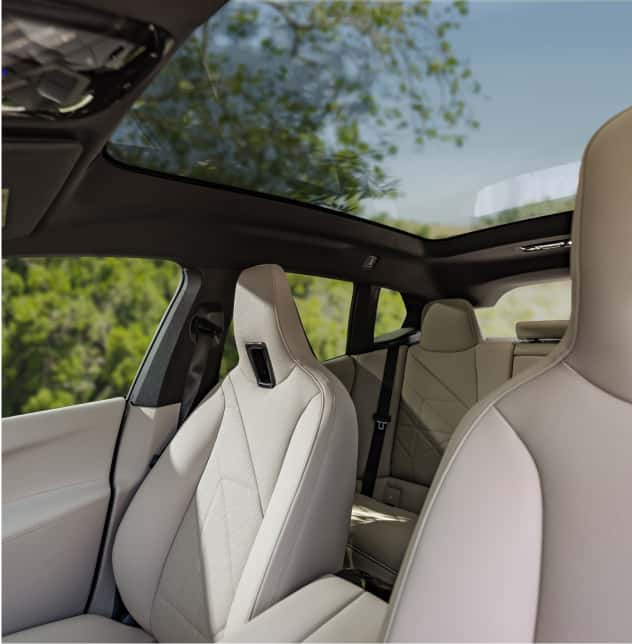 BMW service technician working under a vehicle