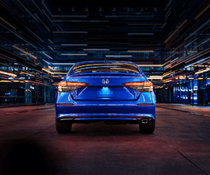 A view of the back of the All-New 2022 Honda Civic in Aegan Blue from the exterior
