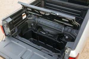 A view of the 2021 Ridgeline's hidden cargo space, located near the tailgate