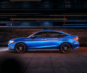 A View of the Left Side from the Exterior of the All-New 2022 Honda Civic in Aegan Blue