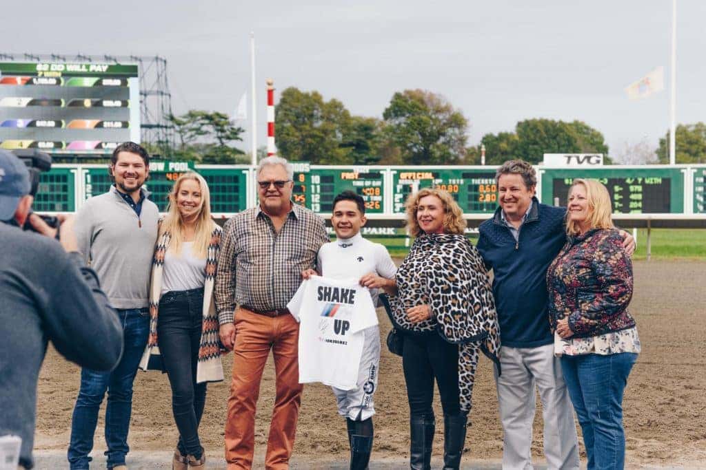 In the winner’s circle with Nik Juarez (center). From left, Thomas DeFelice, III, Kaitlyn Campi, Circle BMW President, Tom DeFelice, Nik Juarez, Valarie DeFelice, Circle BMW GM, Larry Powell and Kathy Powell.