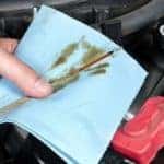 Checking Oil Dipstick in Car