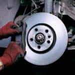 service tech replaces brakes