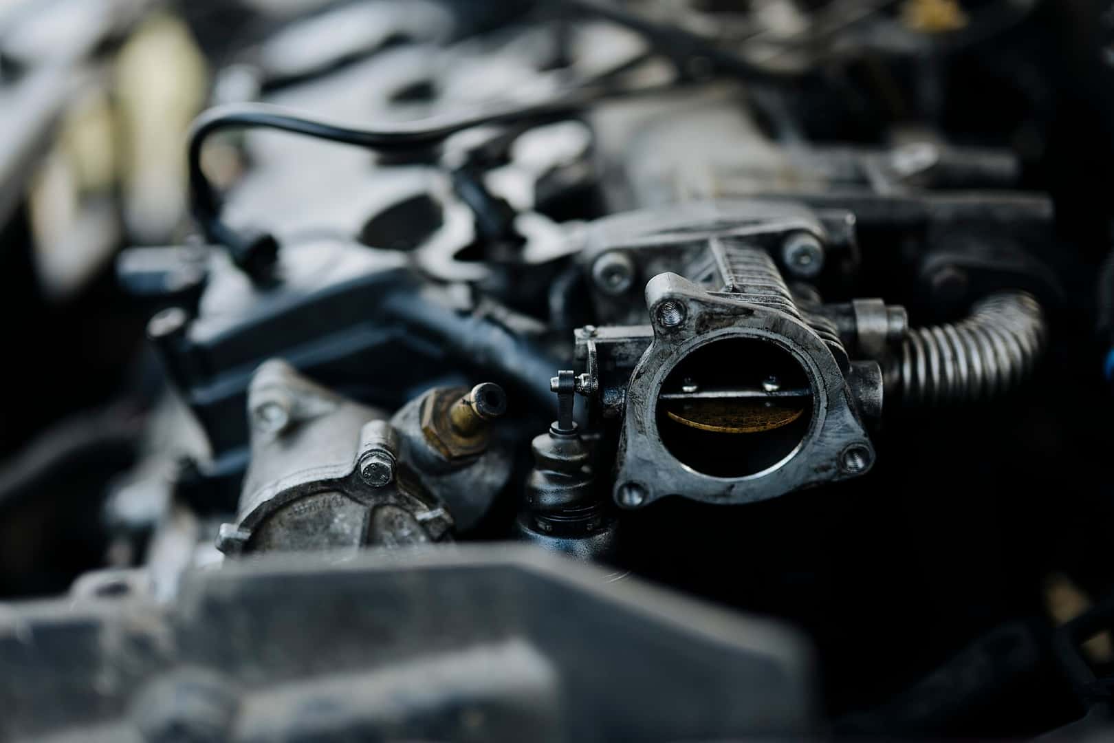 Throttle-body opening and partially closed throttle plate with the intake duct removed