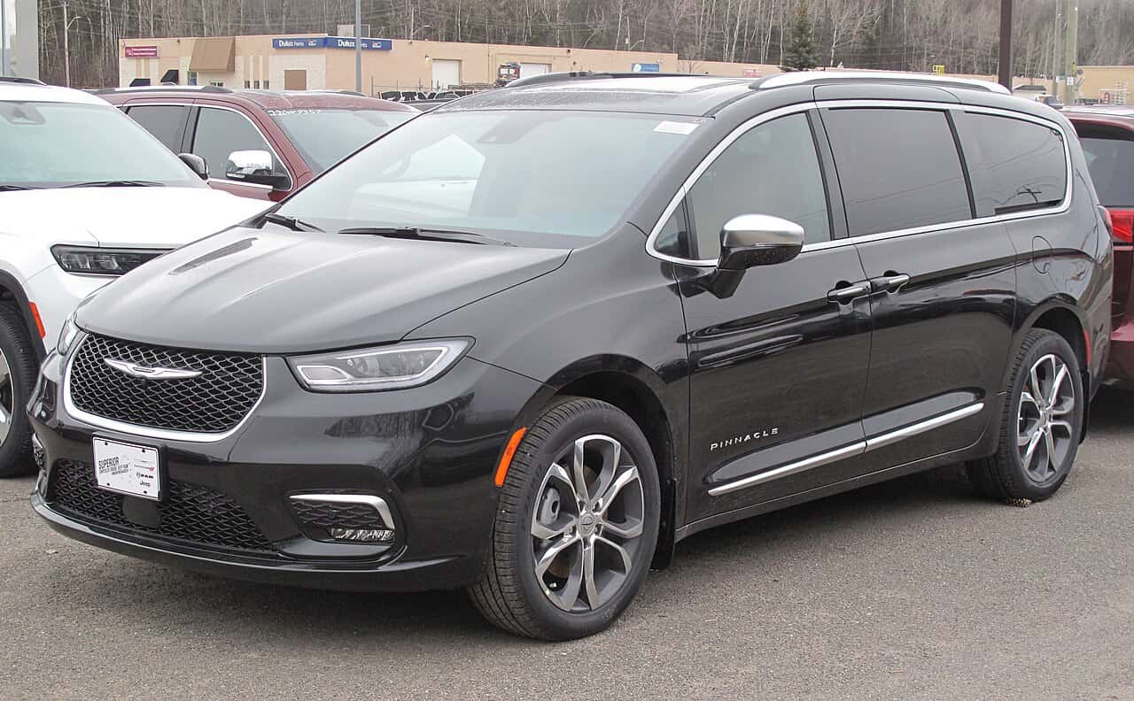 Front three-quarter view of a black 2022 Chrysler Pacifica Pinnacle