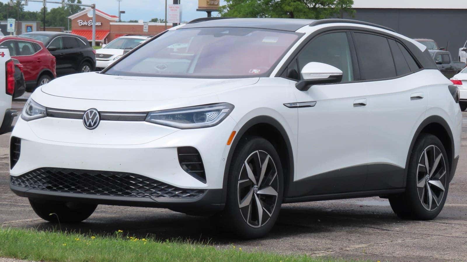 White 2023 Volkswagen ID.4 Pro S electric SUV viewed from the front left.