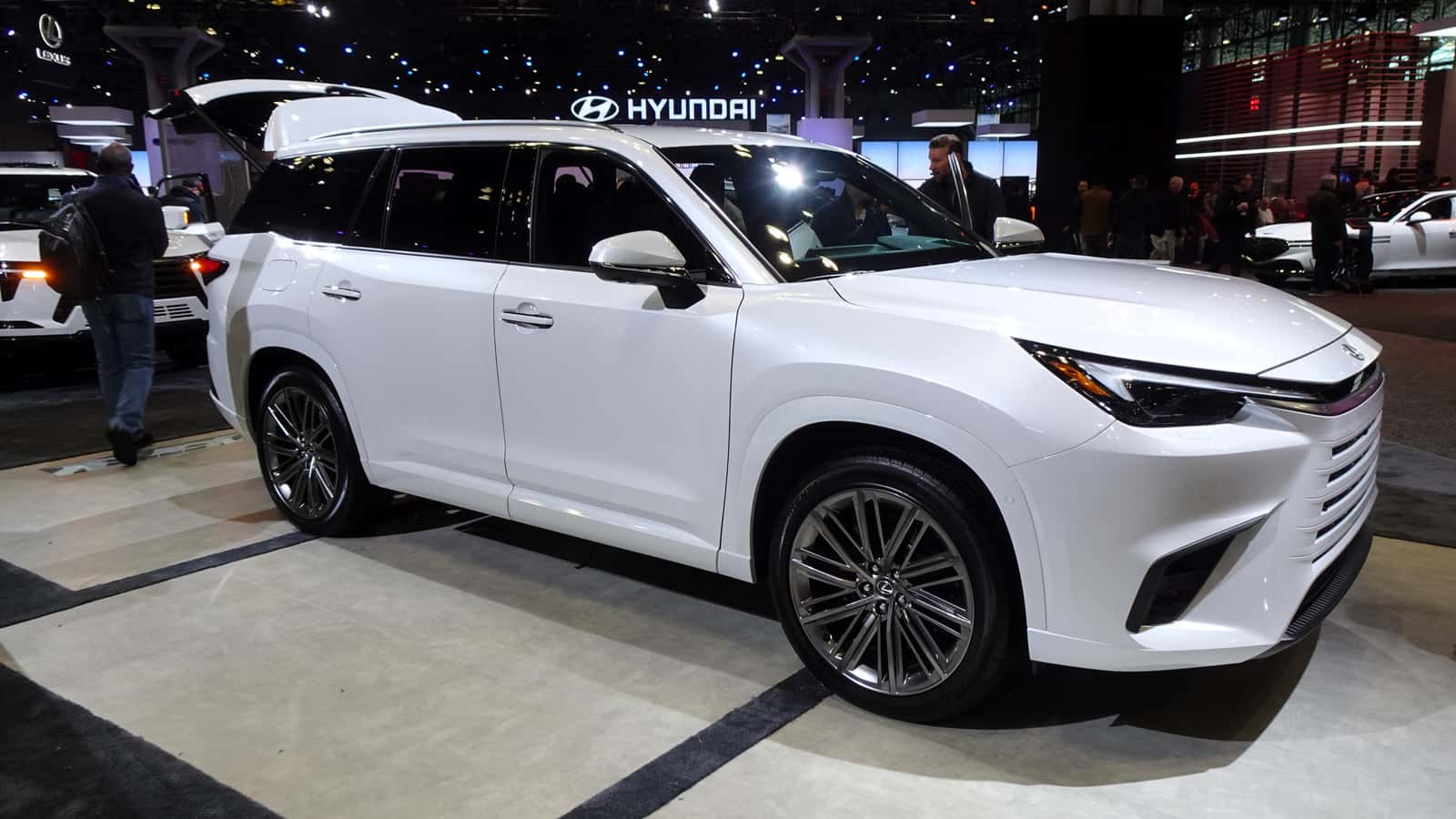 White 2024 Lexus TX 550h+ plug-in hybrid displayed at the New York International Auto Show