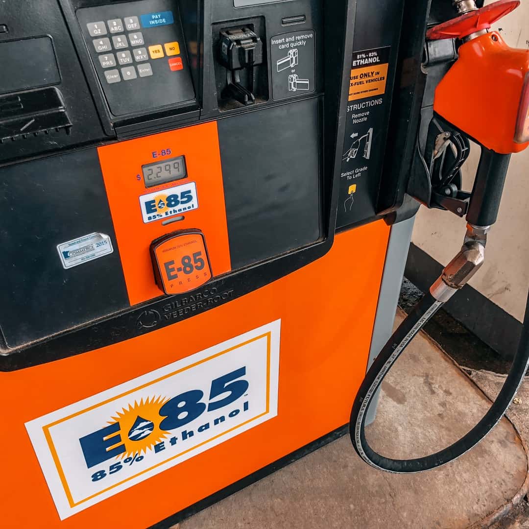 Orange E85-labeled fuel pump with E85 selector and flex-fuel warning