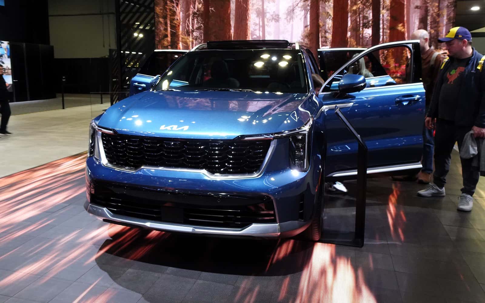 Blue Sorento Turbo Hybrid SX-Prestige AWD displayed at the 2024 New York auto show, used as earlier-model context.