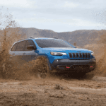 2019 Jeep Cherokee driving through mud