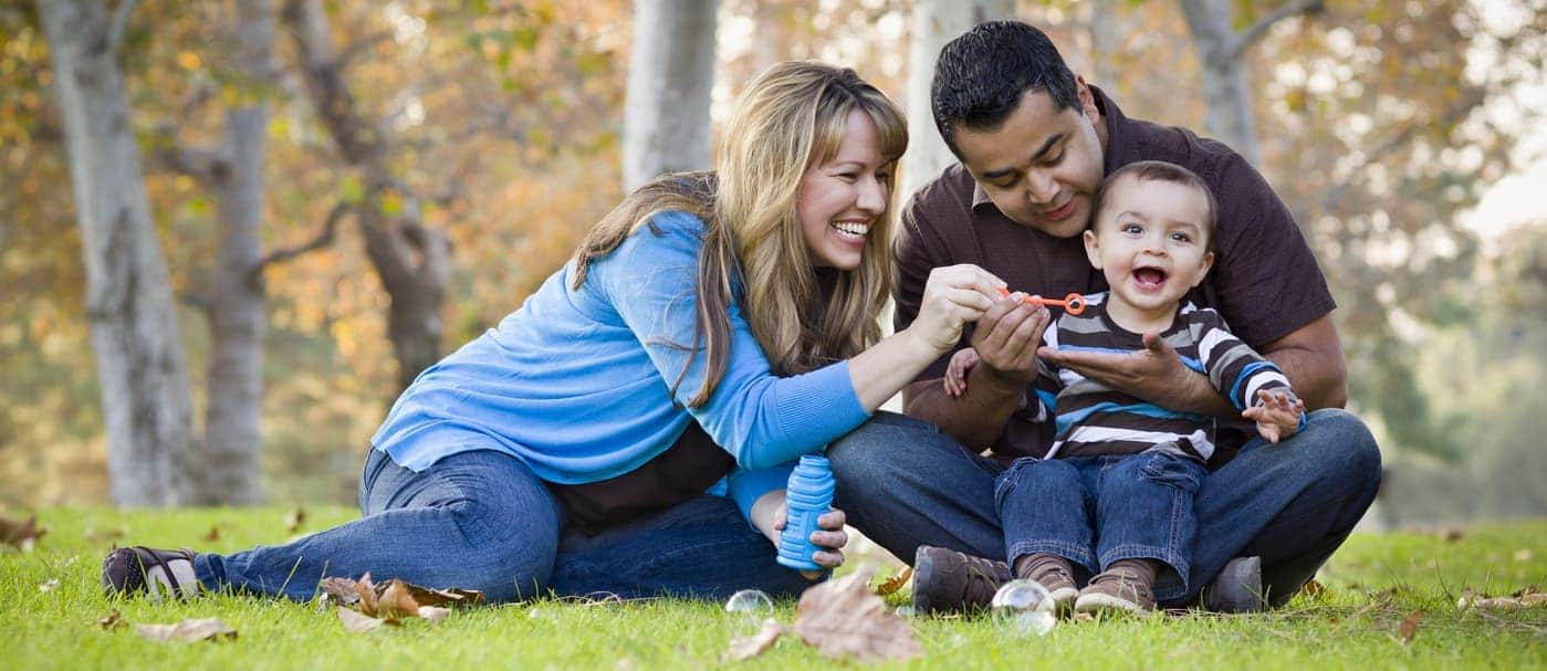 family enjoying themselves at park
