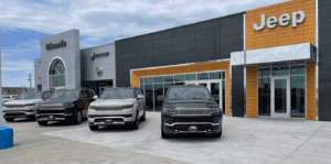 Image of a lineup of four vehicles at Edwards CDJR dealership in Council Bluffs.