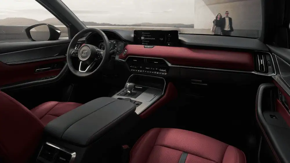2026 Mazda CX-70 driver cockpit with infotainment screen and red leather interior in Hempstead NY