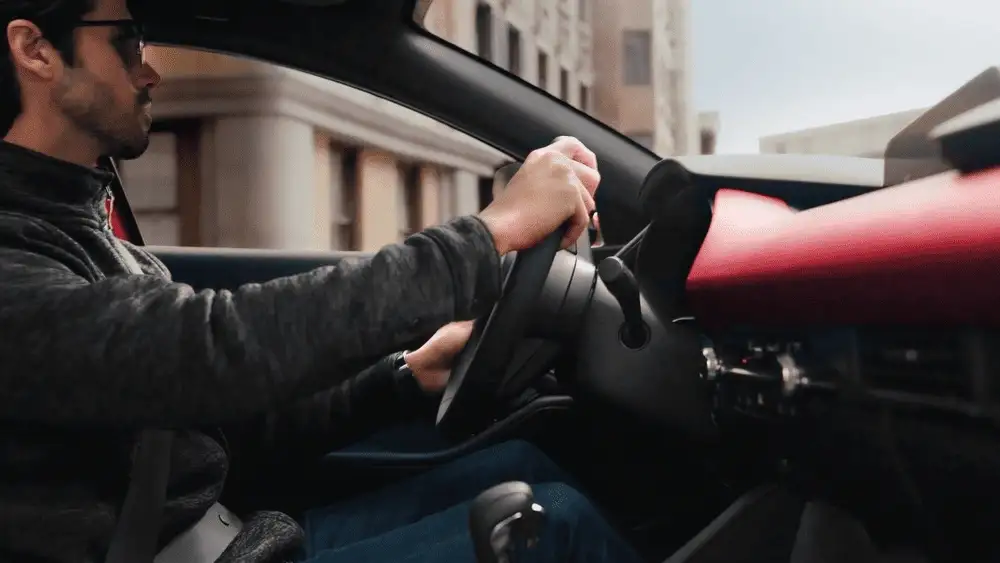 2026 Mazda3 Hatchback driver interior with red leather seats and clean dashboard in Hempstead NY