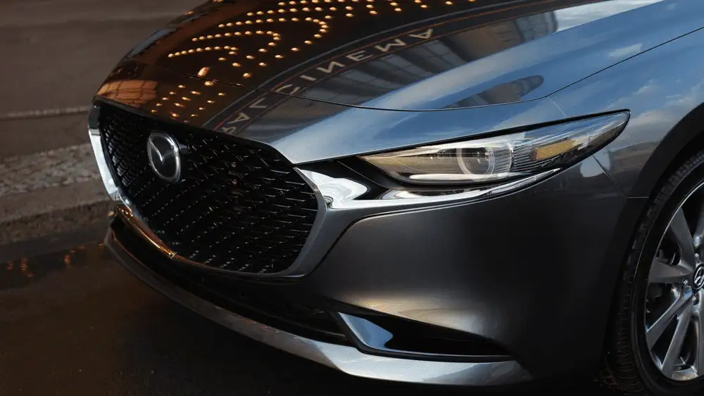 2026 Mazda3 Hatchback front grille and headlight detail with modern styling in Hempstead NY