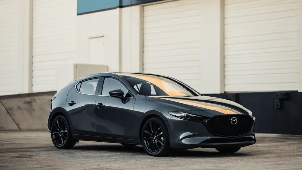 2026 Mazda3 Hatchback parked outdoors with sleek gray exterior in Hempstead NY