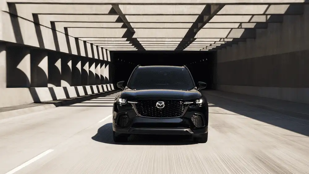 2026 Mazda CX-70 driving through tunnel showcasing sleek design around Hempstead NY