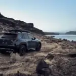2026 Mazda CX-50 parked near scenic lake highlighting rugged capability in Hempstead NY