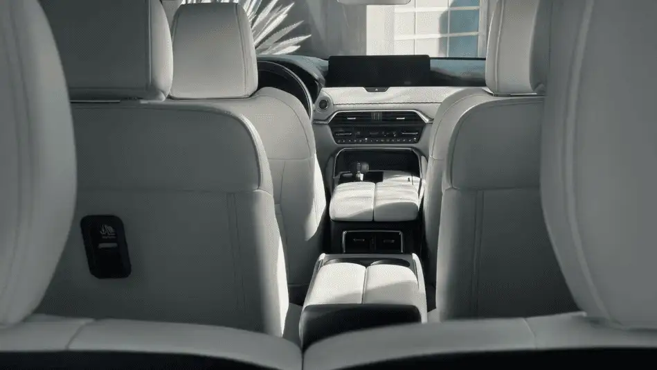 2026 Mazda CX-90 Plug-In Hybrid out to Corona NY in Queens second and third row white leather seating with rear climate vents and wide infotainment screen visible