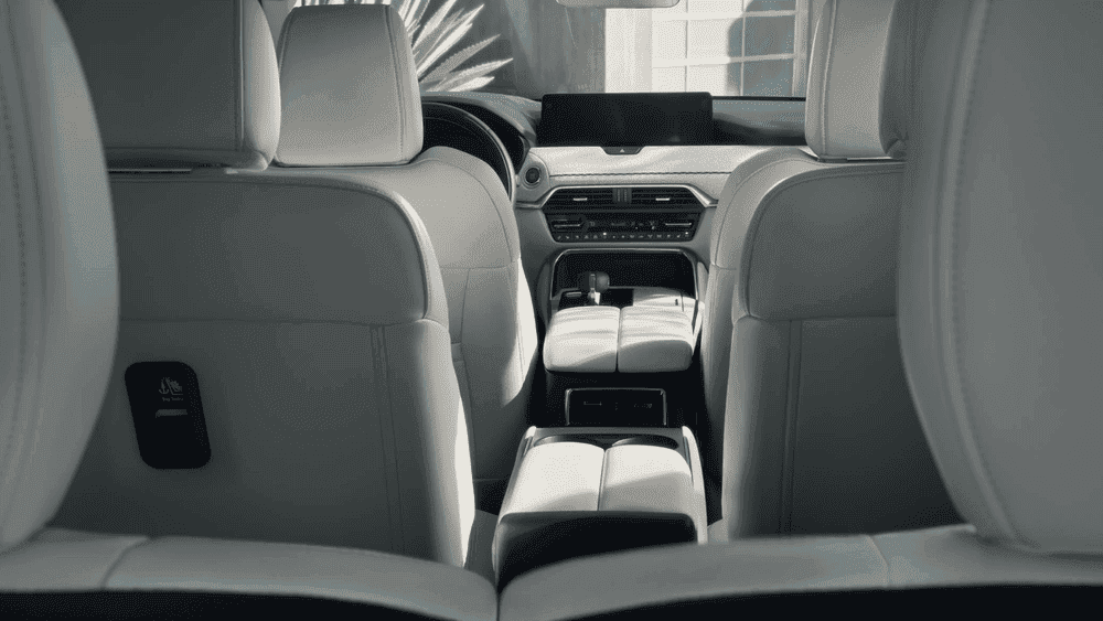 2026 Mazda CX-90 near Hempstead NY, white leather second and third row seats with rear climate vents and infotainment screen visible from back seat