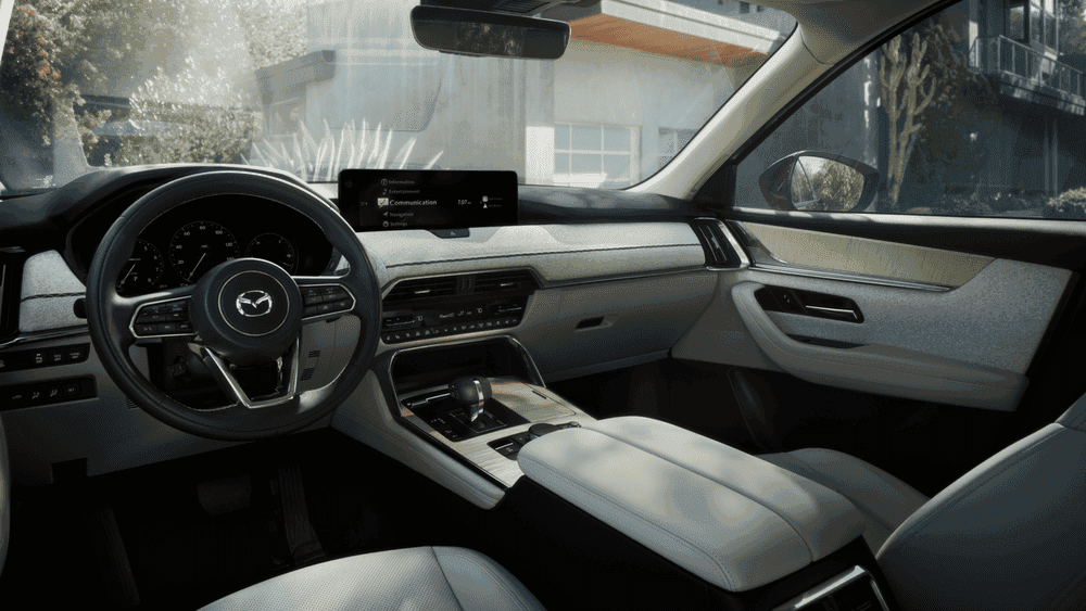 2026 Mazda CX-90 Plug-In Hybrid white leather interior with steering wheel near Uniondale, NY.
