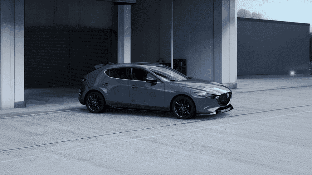 2026 Mazda3 Hatchback in gray parked in a covered garage near Uniondale, NY.