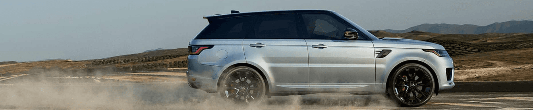 Land Rover Range Rover Sport driving in dust