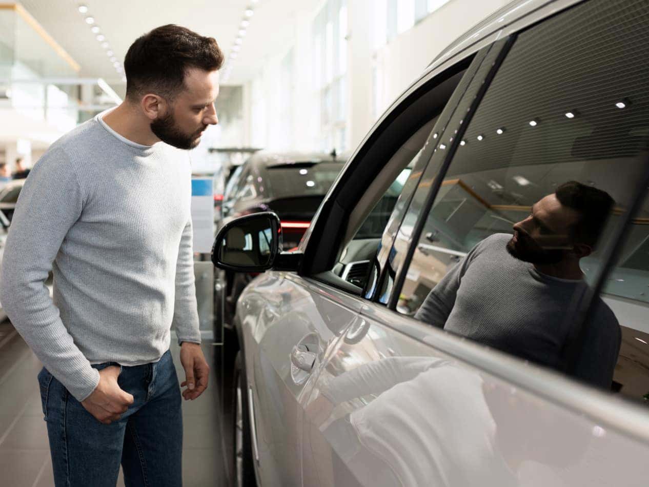 Customer inspecting vehicle