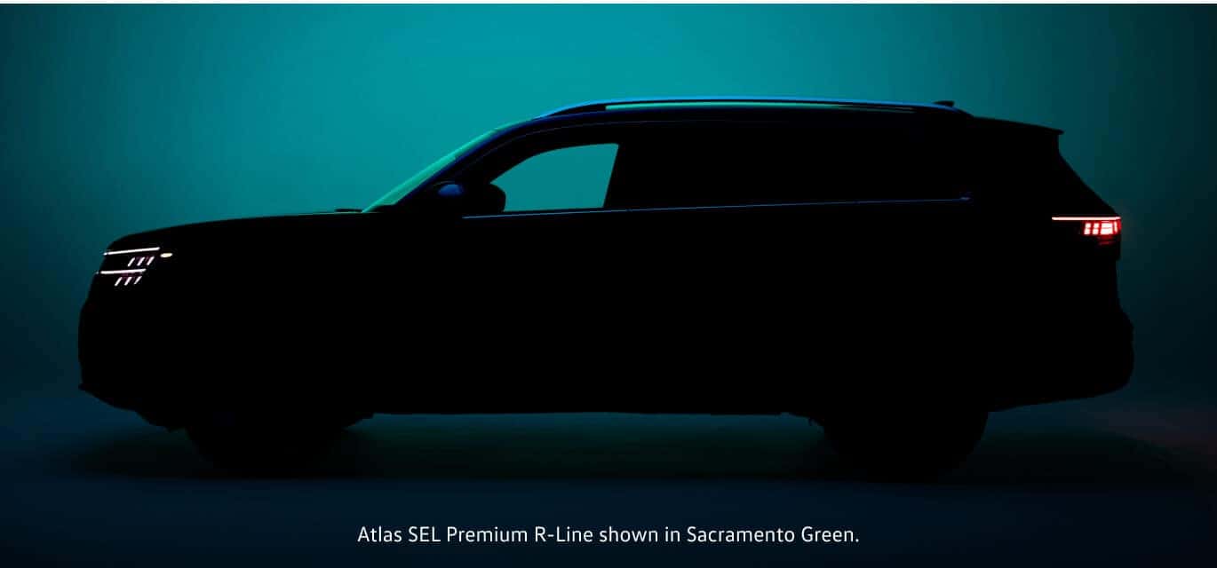 Sacramento Green 2027 Volkswagen Atlas SEL Premium R-Line side silhouette profile in a studio setting.