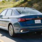 2026 Volkswagen Jetta driving on a scenic highway