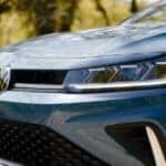 2026 Volkswagen Jetta front grille and headlight close-up outdoors.