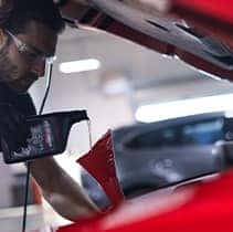 Lancaster Mazda is a Mazda Dealership in Lancaster near Lancaster PA | Mechanic fills car with new oil