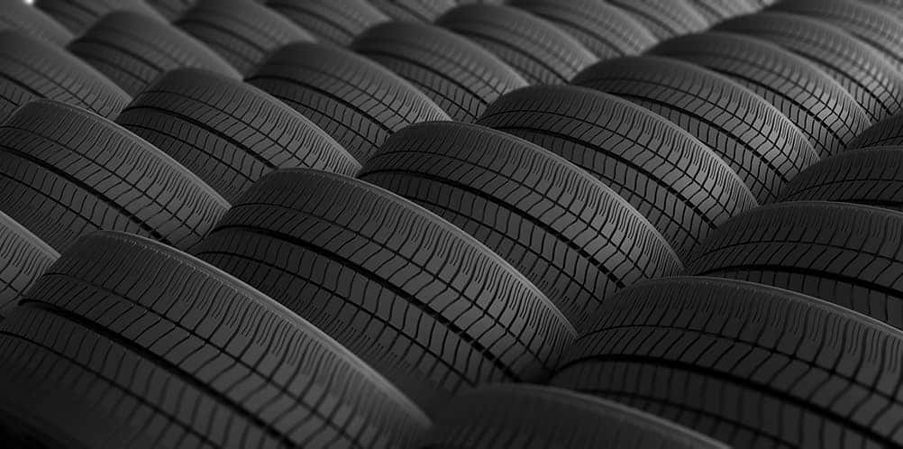 How to check your tires' health at Lancaster Mazda | Multiple tires stacked next to each other