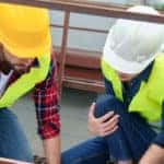 Three Construction Workers Working