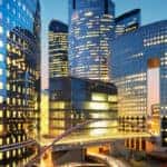 buildings lit up in city