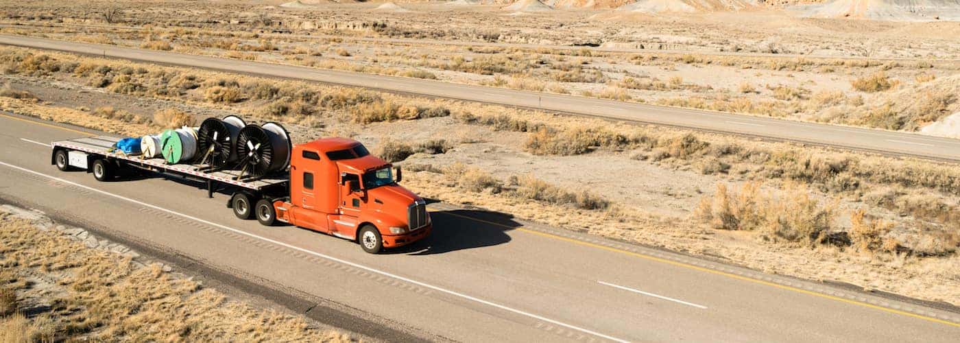 Flatbed Truck on Highway_141238336