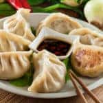 dumplings with pork meat and vegetables on a plate