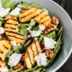 Salad of peaches grilled, cheese and arugula.