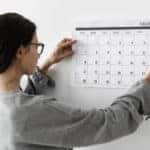 Woman checking the empty calendar