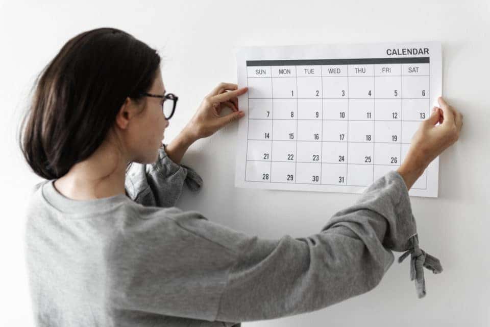 Woman checking the empty calendar