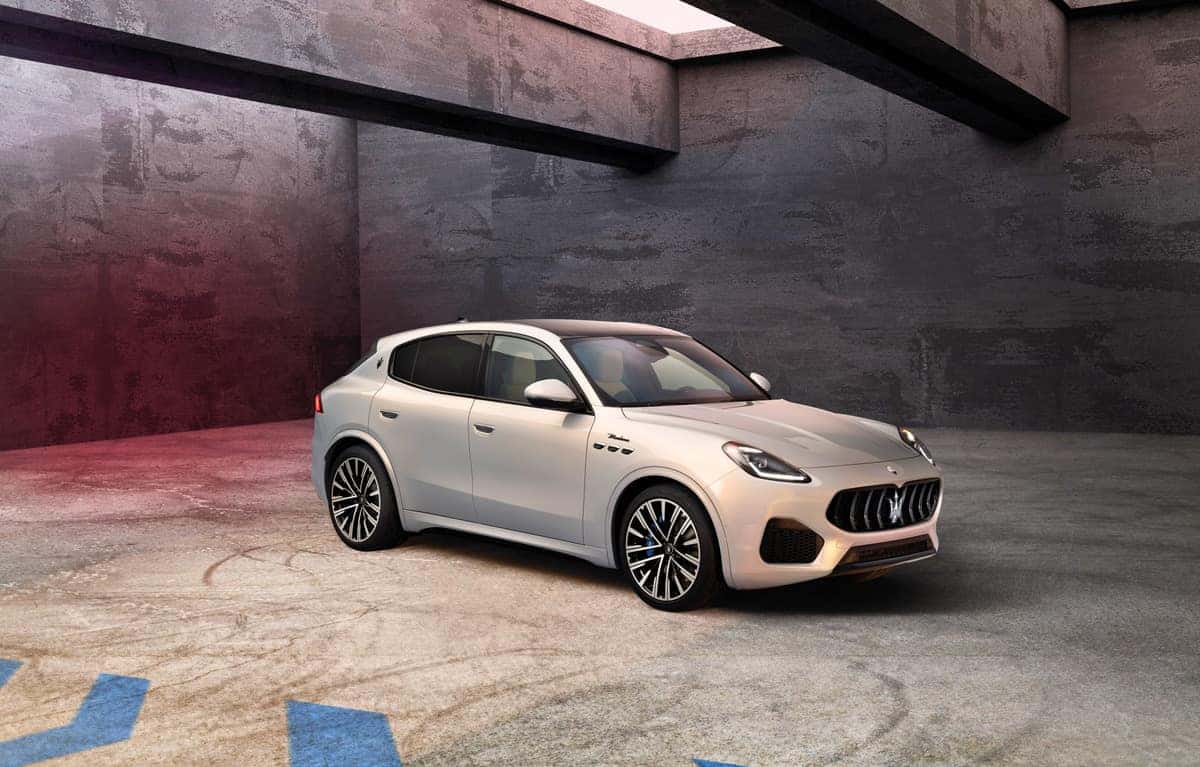 A new Maserati Grecale SUV parked elegantly in a spacious garage, showcasing its sleek design and luxury features.